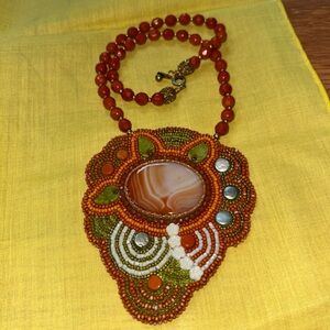 Hand beaded necklace & pendant. Seed beads, artisan closure